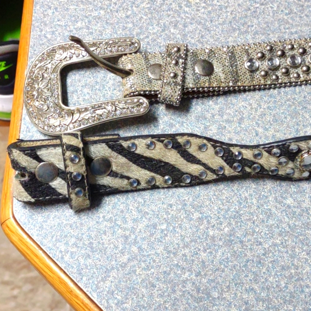 Two girls western belts